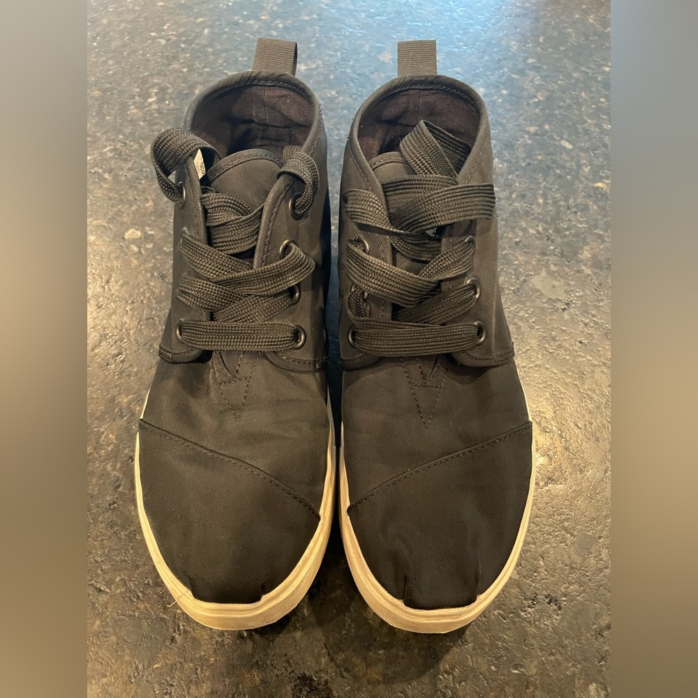 Black Tom’s booties size 7.5, great condition hardly worn (material is cloth)